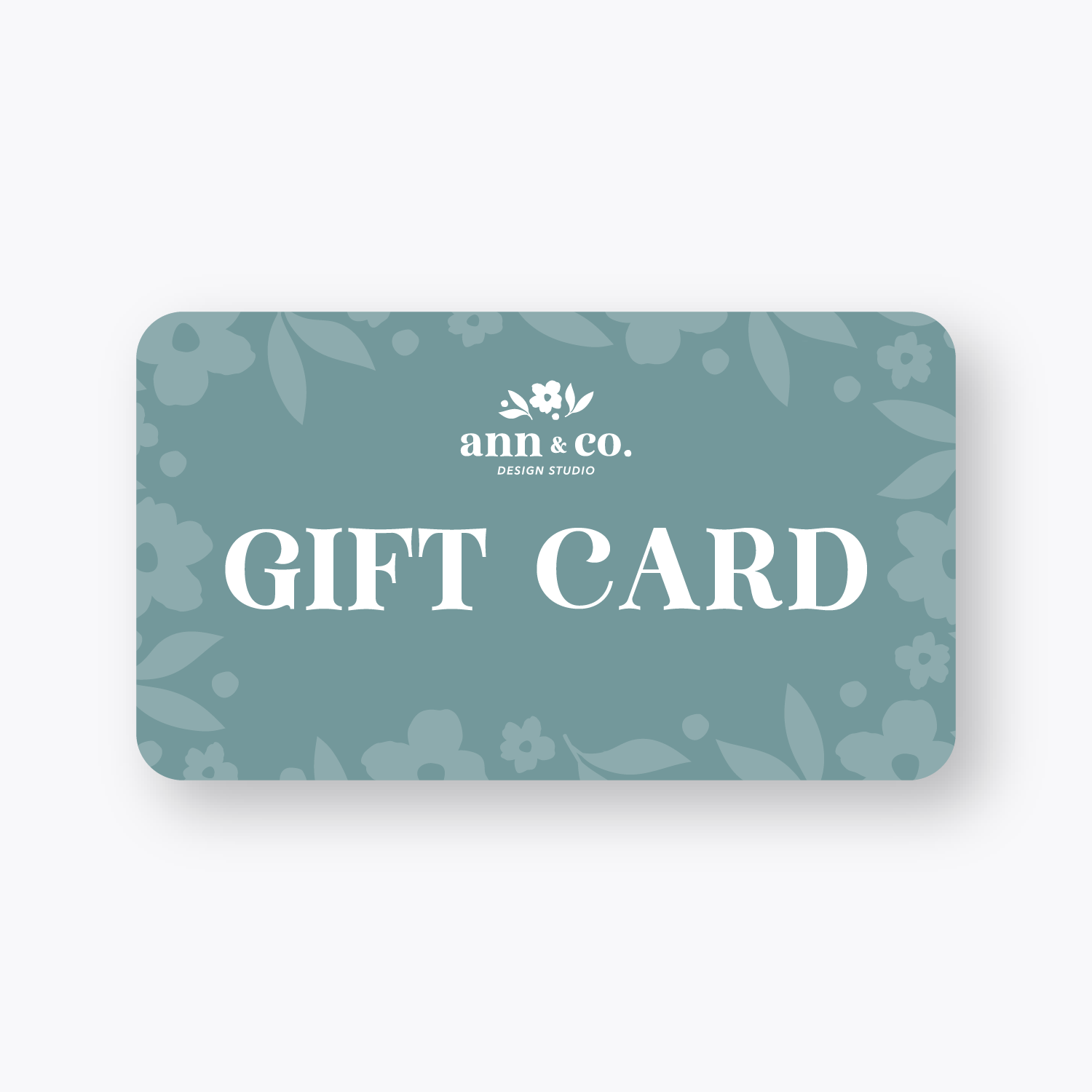 Gift card with floral design and 'ann & co.' branding on a light gray background